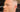 Seitenprofil eines Mannes mit kurzem Skin Fade und Bartstoppeln