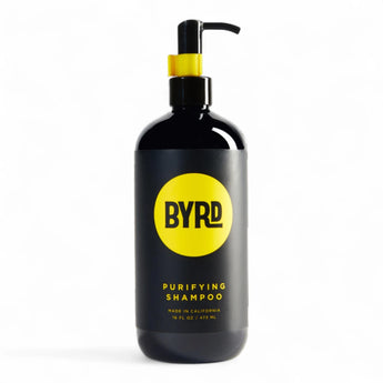 Phullcutz Byrd Purifying Shampoo schwarze Pumpflasche mit gelbem Rundlogo für sulfatfreie Haarreinigung