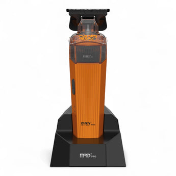 Phullcutz MRD Pro GMT-666 Cyborg Track Trimmer Orange mit schwarzem Schneidkopf in Ladestation für präzise Konturen