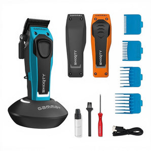 Gamma+ Shorty Clipper in Blau auf Ladestation mit Wechselcovern in Schwarz und Orange, 4 Aufsteckkämmen und Pflegeset